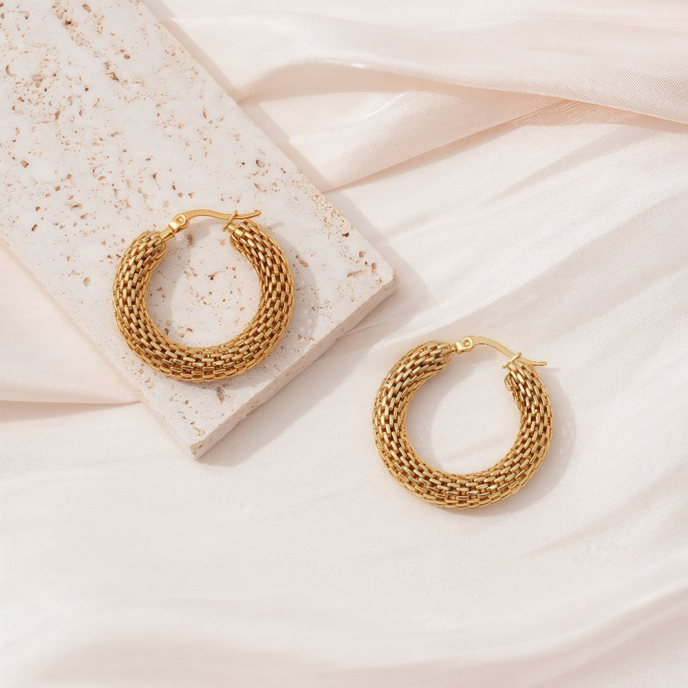 New Hollow Stainless Steel Earrings With A Lychee Grain Pattern
