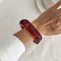Fashionable Metal Crossed Glossy Spring Bracelet