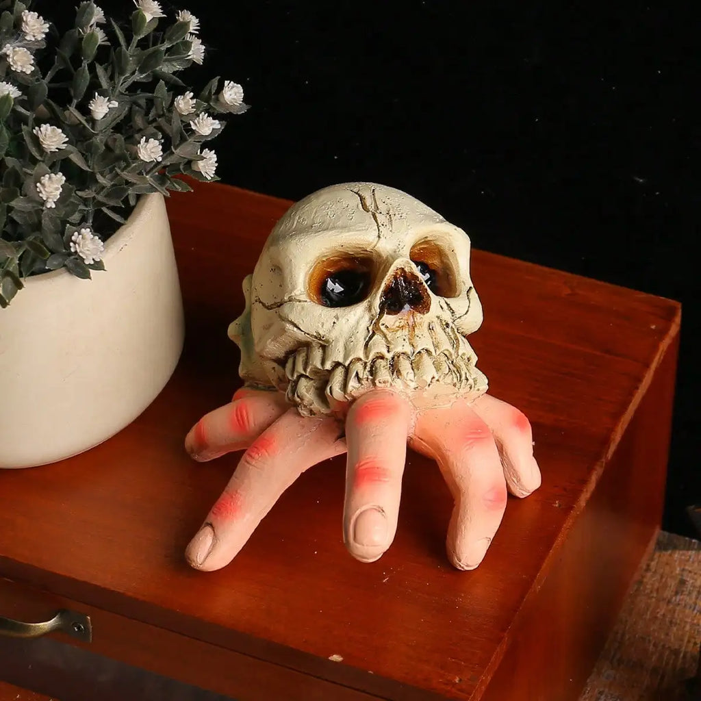 Halloween resin hand held skull ornament, terrifying and realistic skull, suitable for decorating haunted houses and parties