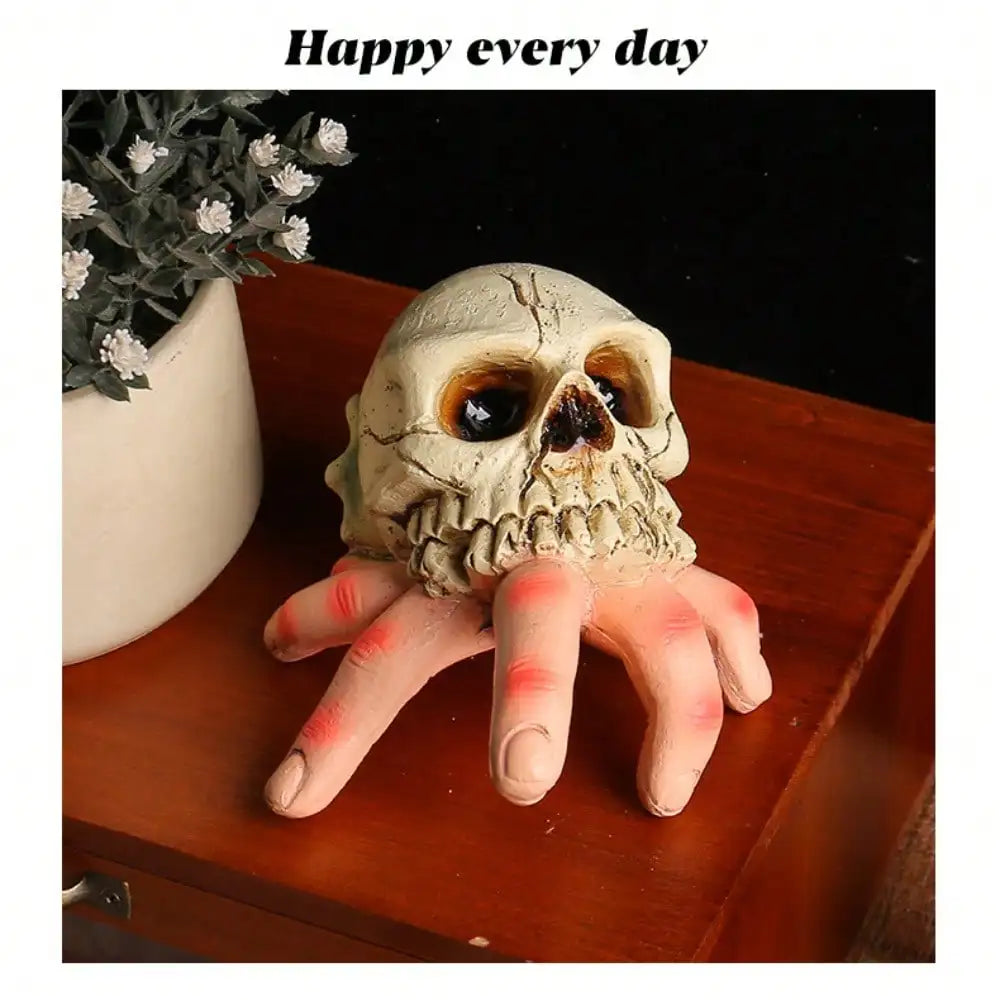 Halloween resin hand held skull ornament, terrifying and realistic skull, suitable for decorating haunted houses and parties